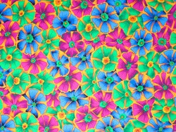 C - Pinwheels (bleu, rose, vert sur fond orange)